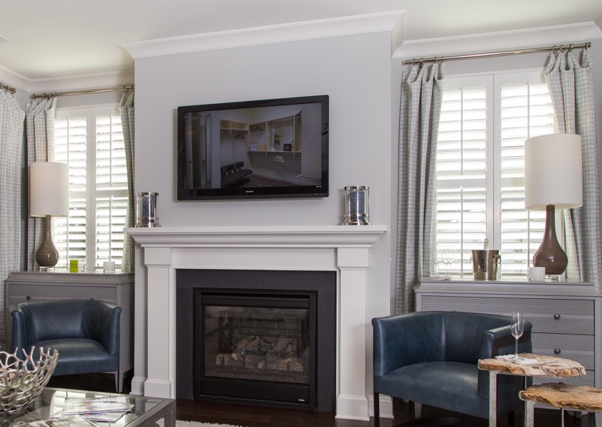 tv room Miami faux wood shutters